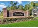 Brick sign for the Corner Lake Estates community with manicured landscaping at 16603 Corner Lake Dr, Orlando, FL 32820