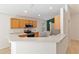 Bright kitchen with updated appliances and a breakfast bar at 16603 Corner Lake Dr, Orlando, FL 32820