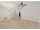 Spacious living room with vaulted ceilings and modern lighting at 16603 Corner Lake Dr, Orlando, FL 32820