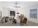 Living room showcases a sliding glass door and neutral decor at 16603 Corner Lake Dr, Orlando, FL 32820