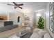 Bright living room featuring modern furniture and an open layout to the dining area at 16603 Corner Lake Dr, Orlando, FL 32820