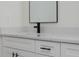 Bathroom featuring a modern vanity with black hardware and quartz countertop at 1868 14Th St, Orange City, FL 32763