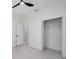 Bright bedroom features tile flooring and a walk in closet at 1868 14Th St, Orange City, FL 32763