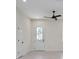 Bright entryway featuring a decorative glass door and white trim at 1868 14Th St, Orange City, FL 32763