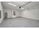 Spacious, bright garage with epoxy flooring, water heater, and plenty of open space at 1868 14Th St, Orange City, FL 32763