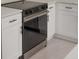 Modern kitchen featuring sleek appliances, minimalist hardware, and white cabinets at 1868 14Th St, Orange City, FL 32763