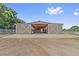 Spacious barn with large doors and ample storage, perfect for agricultural needs and equipment at 19630 County Road 455, Clermont, FL 34715