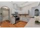 Bright kitchen features stainless steel appliances and ample counter space at 19630 County Road 455, Clermont, FL 34715