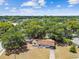 Aerial view of the property showcasing the neighborhood, nearby foliage and the roof of the home at 206 Gerry Dr, Altamonte Springs, FL 32714