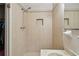 Tiled bathroom showcasing a walk-in shower with neutral walls and practical design at 206 Gerry Dr, Altamonte Springs, FL 32714