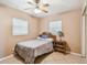 Modest bedroom with ceiling fan, tile floor and window offering natural light at 206 Gerry Dr, Altamonte Springs, FL 32714