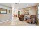 Comfortable living room with neutral tones, tile flooring, and ample space for relaxation at 206 Gerry Dr, Altamonte Springs, FL 32714