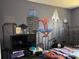 Bedroom featuring a desk with a computer, a bed with a Spiderman mural backdrop at 2061 Piedmont Park Blvd, Apopka, FL 32703