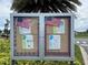 Community bulletin board with patriotic decorations and neighborhood information at 2061 Piedmont Park Blvd, Apopka, FL 32703
