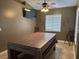 Cozy dining room with a large table, seating and a ceiling fan with light provides a great space for entertaining at 2061 Piedmont Park Blvd, Apopka, FL 32703