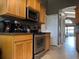 A spacious kitchen with stainless steel appliances and plenty of cabinet space for storage, and an open layout at 2061 Piedmont Park Blvd, Apopka, FL 32703