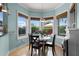 Charming breakfast nook with natural light, overlooking the pool and outdoor area at 207 Via Tuscany Loop, Lake Mary, FL 32746