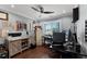 Functional home office with built-in storage, a ceiling fan, and a large window for natural light at 207 Via Tuscany Loop, Lake Mary, FL 32746
