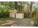 View of shed in the backyard with lush greenery at 241 Ruth Blvd, Longwood, FL 32750