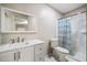 Bright bathroom with shower, toilet, and single sink vanity at 241 Ruth Blvd, Longwood, FL 32750