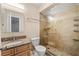 Modern bathroom with walk-in shower, granite vanity, and tiled walls, offering a luxurious experience at 241 Ruth Blvd, Longwood, FL 32750