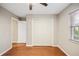 Cozy bedroom with hardwood floors and neutral walls, offering a comfortable and versatile living space at 241 Ruth Blvd, Longwood, FL 32750