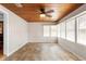 Sunroom with wood paneled ceiling, neutral paint color, tile floor and lots of windows at 2678 Wilmhurst Rd, Deland, FL 32720