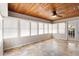 Bright sunroom with wood paneled ceiling, and multiple windows at 2678 Wilmhurst Rd, Deland, FL 32720