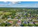 A captivating aerial view shows the neighborhood and its proximity to parks and recreational areas at 3256 Amber St, Deltona, FL 32738