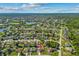 A charming neighborhood featuring a well-maintained single Gathering home near a lake and lush greenery at 3256 Amber St, Deltona, FL 32738