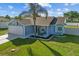 Charming one-story home with a well-manicured lawn, cozy front porch and inviting curb appeal at 3256 Amber St, Deltona, FL 32738