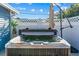 Relaxing hot tub in a backyard setting, offering a private and luxurious experience with comfortable seating around it at 3256 Amber St, Deltona, FL 32738