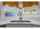 Close up of a stylish sink with stone countertop and stainless steel faucet at 3256 Amber St, Deltona, FL 32738