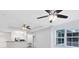Bright living area connecting to modern kitchen, with updated lighting at 3280 Soho St # 306, Orlando, FL 32835