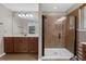 Bathroom with a large vanity, a tiled shower, and a window for natural light at 480 Buckhorn Dr, Winter Springs, FL 32708