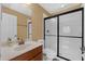 Bright bathroom with a modern glass shower and a vanity with ample counter space at 480 Buckhorn Dr, Winter Springs, FL 32708