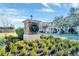 Well-manicured landscaping and Winter Springs Village sign create a welcoming entrance at 480 Buckhorn Dr, Winter Springs, FL 32708