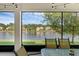 Relaxing screened lanai area offers amazing water views and a cool shaded space at 480 Buckhorn Dr, Winter Springs, FL 32708