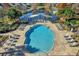 Aerial view of community pool featuring lounge chairs, gazebo, and pond at 480 Buckhorn Dr, Winter Springs, FL 32708