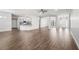 Open-concept living room featuring recessed lighting and light gray walls adjoining kitchen at 4940 Tennessee Lake Dr, Auburndale, FL 33823