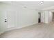 Living room with tiled flooring, recessed lights and access to other rooms at 4940 Tennessee Lake Dr, Auburndale, FL 33823