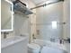 Bright bathroom with a glass-enclosed shower and modern sink at 5708 Emerington Cres, Orlando, FL 32819