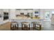 Well-equipped kitchen with a breakfast bar and stylish cabinetry for ample storage at 7206 Nottingham Reel Ct, St Cloud, FL 34773