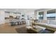Inviting living room connected to the kitchen, featuring an open floor plan at 7206 Nottingham Reel Ct, St Cloud, FL 34773