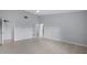 Spacious bedroom with walk in closet, ceiling fan and neutral paint at 7237 Woodville Cres, Orlando, FL 32819