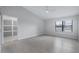 Bedroom features natural light and neutral color palette at 7237 Woodville Cres, Orlando, FL 32819