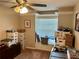 Bedroom with a bay window and boxes for storage at 734 La Costa St, Minneola, FL 34715