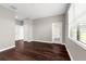 Bedroom with hardwood floors and access to the outside at 8970 Azalea Sands Ln # 2302, Davenport, FL 33896