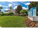 Oasis Clubhouse entrance at Champions Gate features a building with lush landscaping at 8970 Azalea Sands Ln # 2302, Davenport, FL 33896