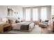 Serene bedroom with plush bedding, natural light, and contemporary furnishings at 917 Lake Emerald Dr, Orlando, FL 32806